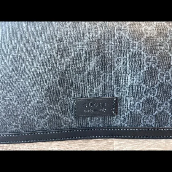 I am selling a Gucci x Supreme Diaper Bag